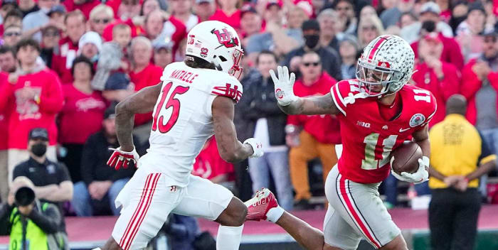 Ohio State Buckeyes wide receiver Jaxon Smith-Njigba (11) runs past Utah Utes cornerback Malone Mataele (15) during the second quarter of the Rose Bowl in Pasadena, Calif. on Jan. 1, 2022.